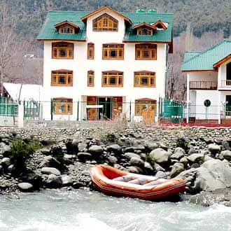 https://imgcld.yatra.com/ytimages/image/upload/t_hotel_yatra_city_desktop/v1463532959/Domestic Hotels/Hotels_Pahalgam/Hotel Grand Lord/HO_oxtDyq.jpg